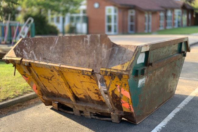 Untitled design – 2026-10-06T132813.992 skip outside a house