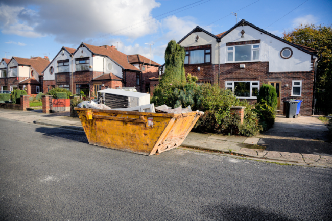 skip outside a home in a residential street