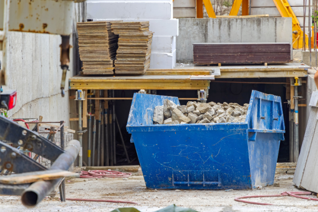 skip outside a building project